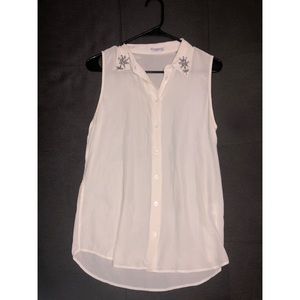 Equipment white sleeveless blouse with rhinestones